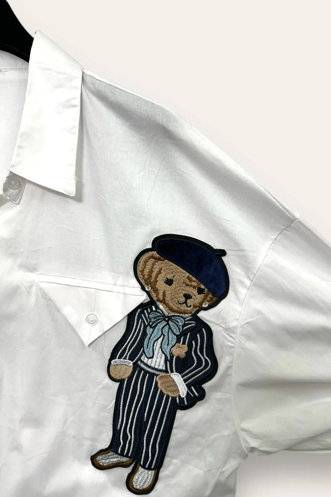 LOVEme Camicia over con orso applicato e tasca triangolare