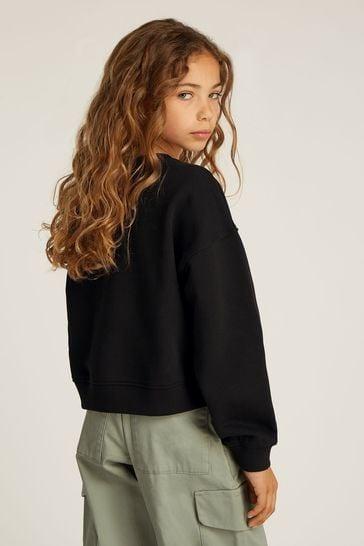 CALVIN KLEIN JEANS GLITTER MONOLOGO CN SWEATSHIRT