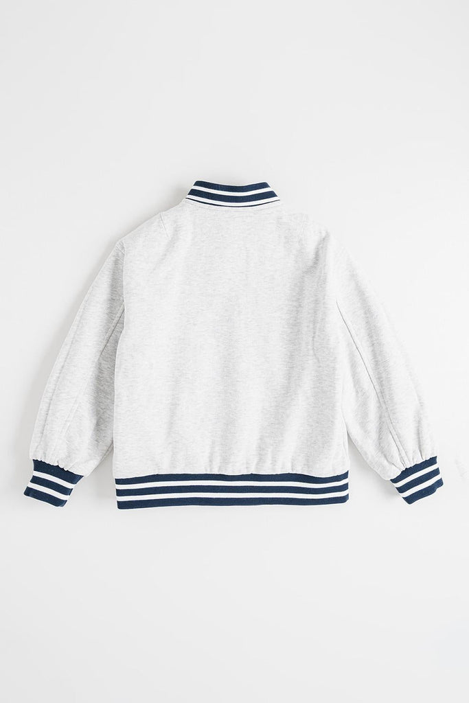 TOMMY HILFIGER REVERSIBLE BOMBER JACKET