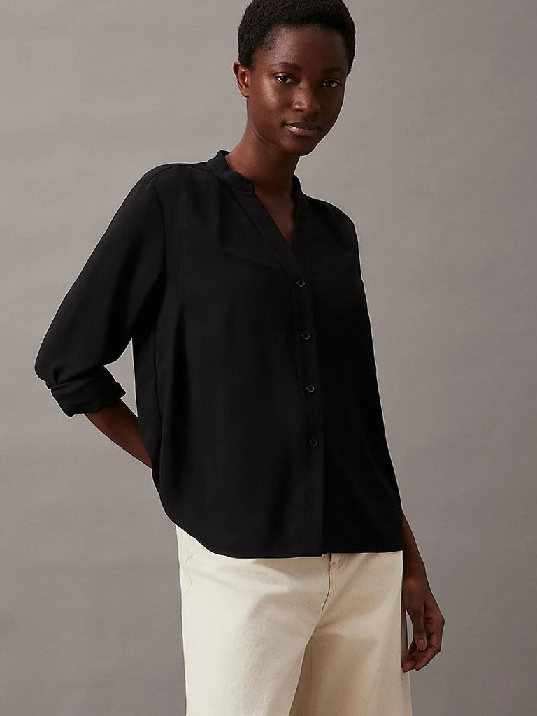 CALVIN KLEIN COLLARLESS LONG SLEE