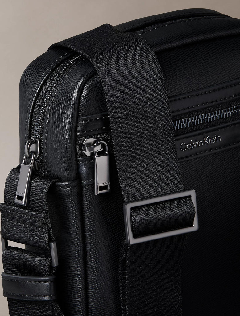 CALVIN KLEIN ZIP REPORTER