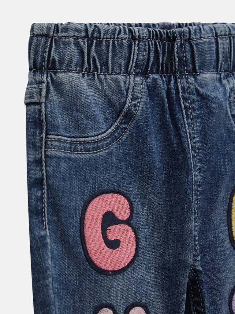 GUESS STRETCH DENIM PANTS W/LETTERS